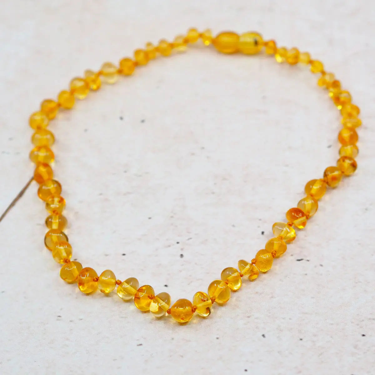 collier-d-ambre-646tsq-1.jpg collier d ambre – Image 1